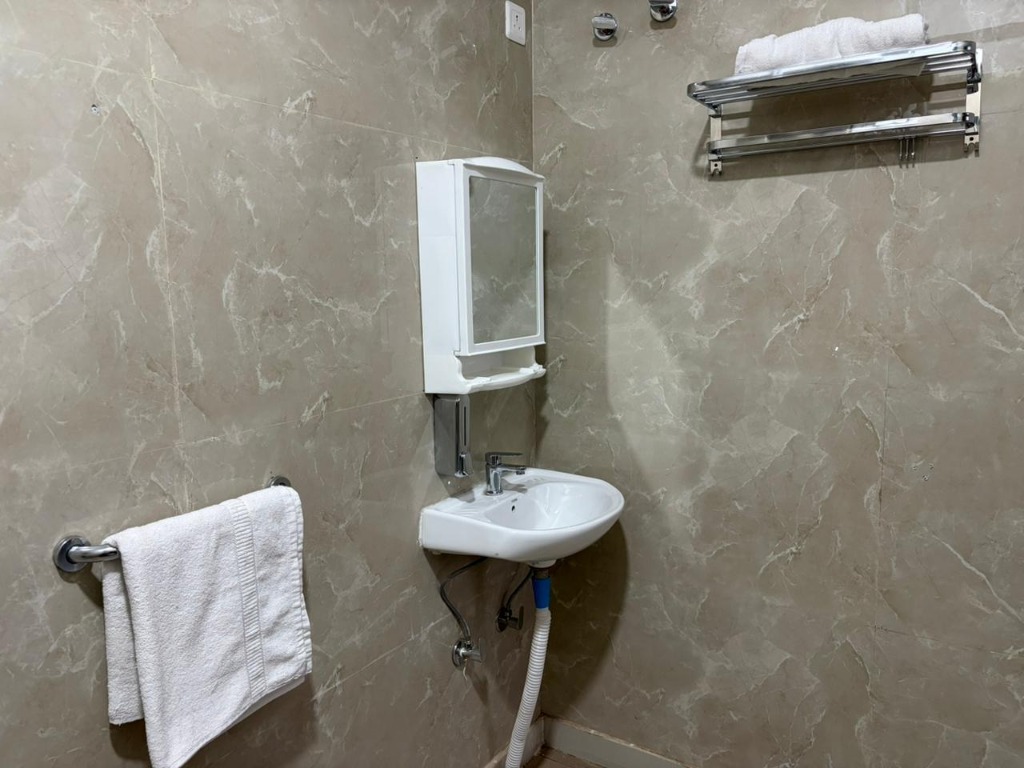 Real accessible washroom sink area at SixtyPlusZone with ample space